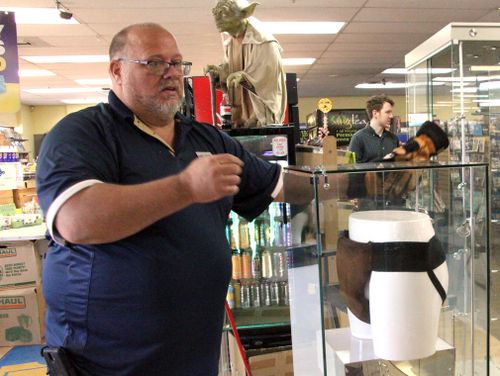 Blockbuster Alaska General Manager Kevin Daymude shows off the jockstrap worn by actor Russell Crowe in the 2005 movie "Cinderella Man", donated to him by John Oliver. (AP)