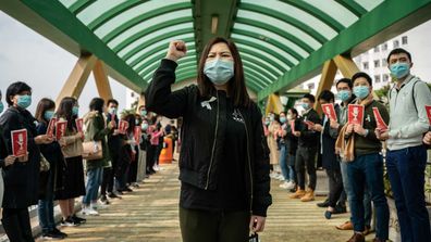 Health workers in Hong Kong protest coronavirus protocols.