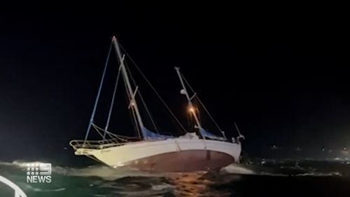 A father and his son are lucky to be alive after their yacht crashed into a reef late Thursday night in Western Australia.