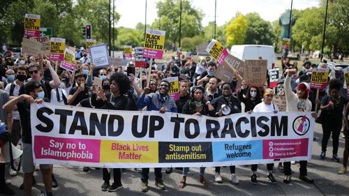 Anti-racism protesters attend a Black Lives Matter demonstration on June 13, 2020 in London, England.