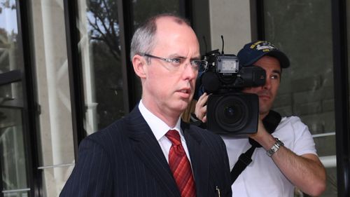 Solicitor-General Stephen Donaghue arrives at the High Court on Friday. (AAP)