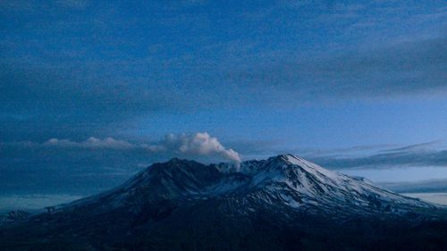 Mount St Helens emits a small, steady cloud of steam at dusk in Washington state. In March, 2005. (Picture: AP)