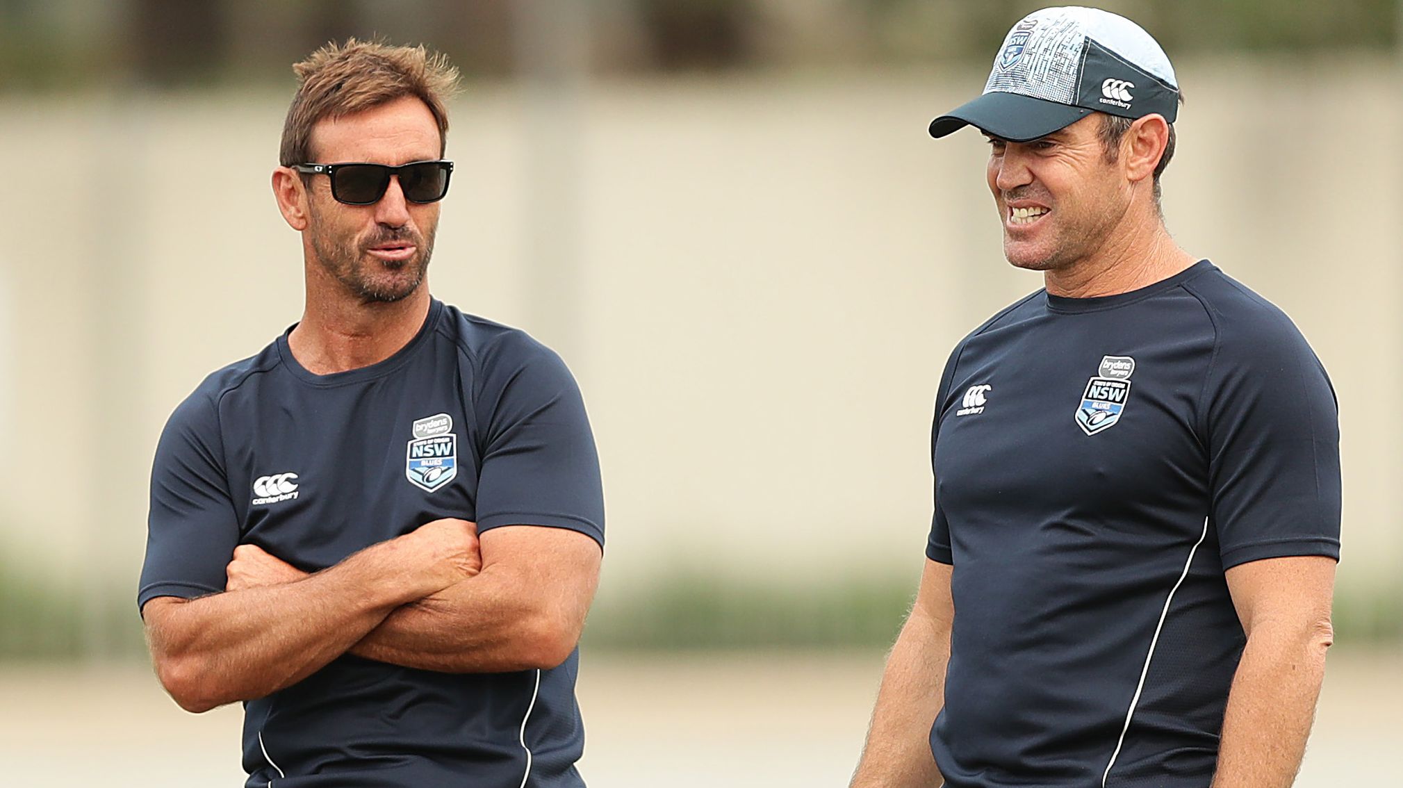 Former NSW Blues head coach Brad Fittler (right) speaks to Andrew Johns.