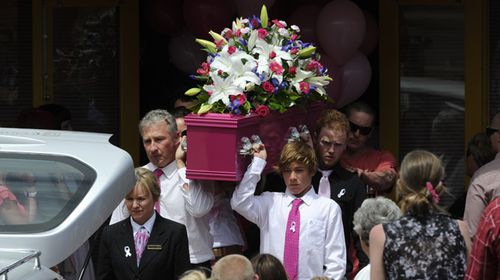 Pallbearers carry Sarah Cafferkey's coffin from St Andrew's Uniting Church in Bacchus Marsh.