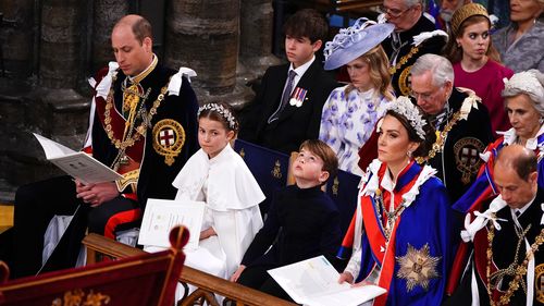 LONDON, ENGLAND - MAY 06: (Bottom L to R) Britain's Prince William, Prince of Wales, Princess Charlotte, Prince Louis, Britain's Catherine, Princess of Wales, Prince Edward, Duke of Edinburgh. (Top L to R) James, Earl of Wessex, Lady Louise Windsor, Prince Richard, Duke of Gloucester and Birgitte, Duchess of Gloucester attend the Coronation of King Charles III and Queen Camilla at Westminster Abbey on May 6, 2023 in London, England. The Coronation of Charles III and his wife, Camilla, as King an