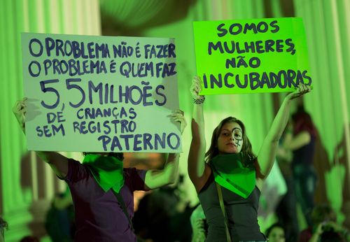 Hundreds of women flooded Rio de Janeiro's streets in Brazil overnight to demand the legalisation of abortion in the country. Picture: AP.