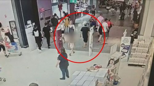 CCTV shows the little girl being lead away by Sterling Free.