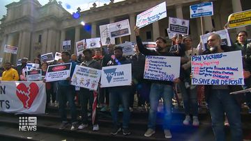 Furious families affected by construction giant Porter Davis&#x27; collapse have taken to the steps of the Victorian State Parliament demanding the government pay back tens of thousands of dollars in lost deposits.