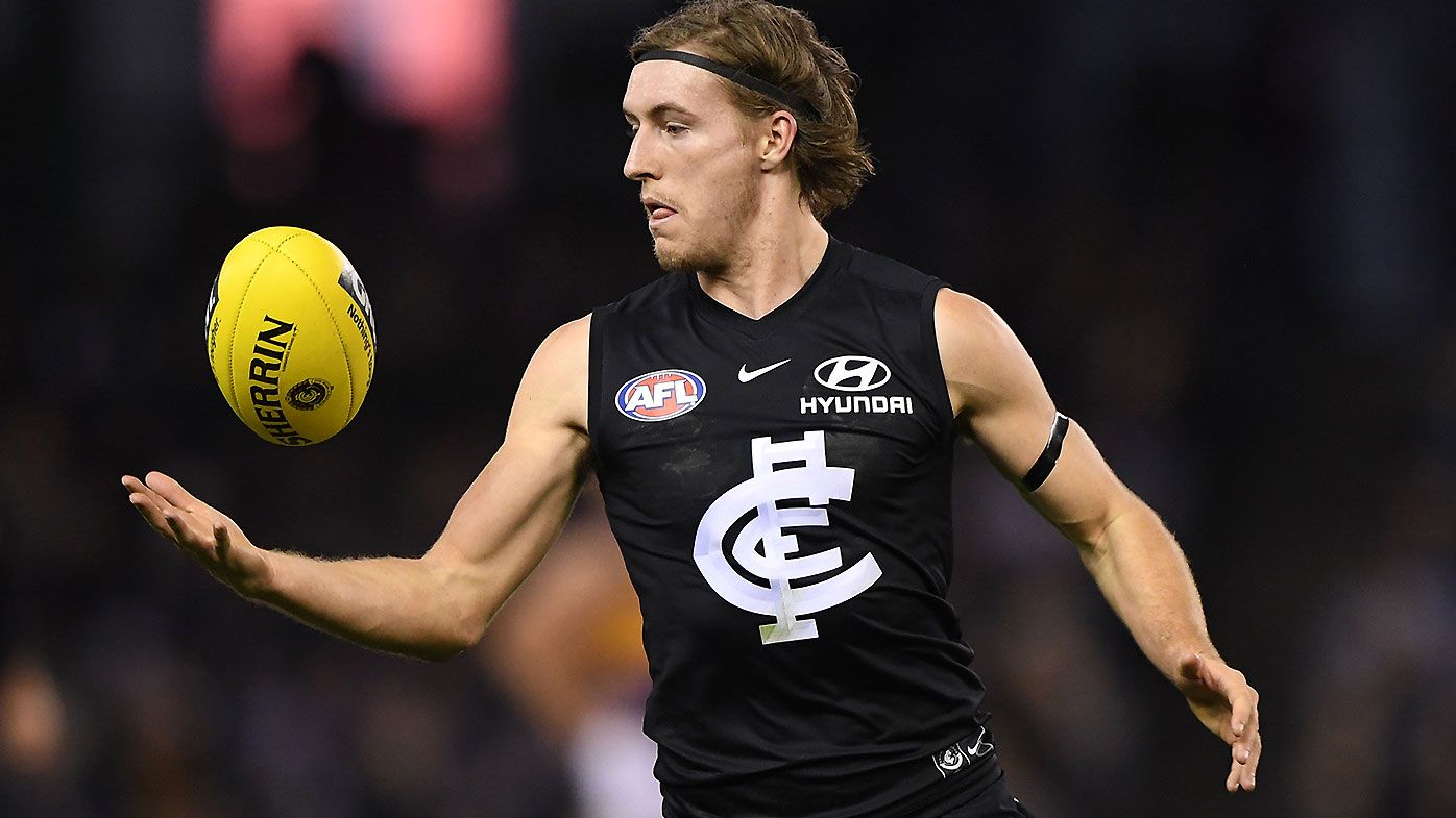 'His eyes were everywhere': AFL umpire praised after notifying doctors of Carlton star's concussion