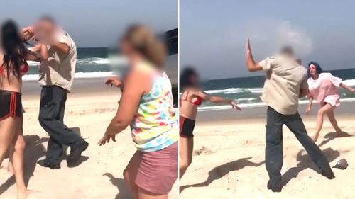 A woman has been charged with assaulting two rangers at Bribie Island.