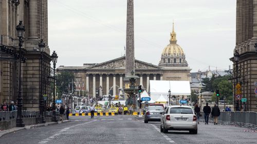 Police open fire after car tries to ram Tour de France barrier