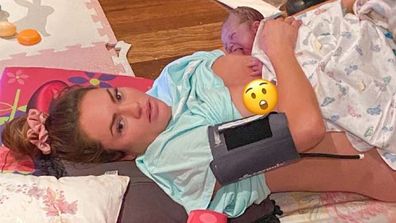 Fitness Influencer Emily Skye lying in her living room in a pile of blood and water after giving birth to her son