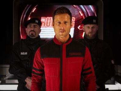 This image released by Paramount Pictures shows Glen Powell in a scene from The Running Man. 