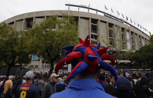 upporters wait outside the the Camp Nou stadium ahead of the Spanish La Liga soccer match between Barcelona and Las Palmas. (AP)