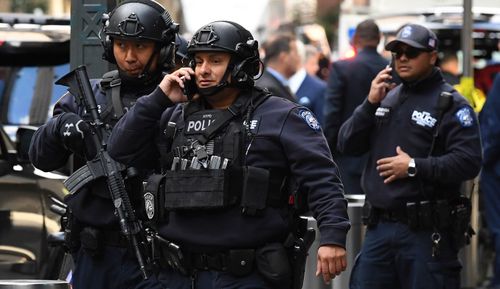 Bomb squads at the CNN offices in the Time Warner building in Manhattan's Columbus Circle near Central Park after the pipe bomb delivery.