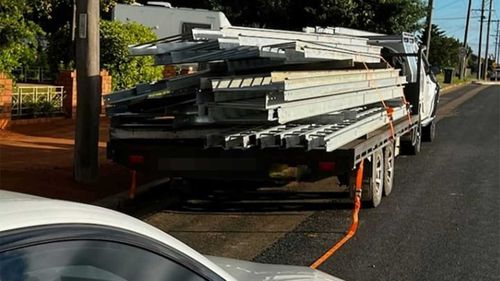 The driver was issued an infringement for driving with an unsecured load.