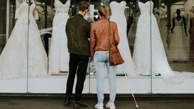 Stef Agnew, who has lost her sight, with brother Callum- who has sight- at the wedding shop.