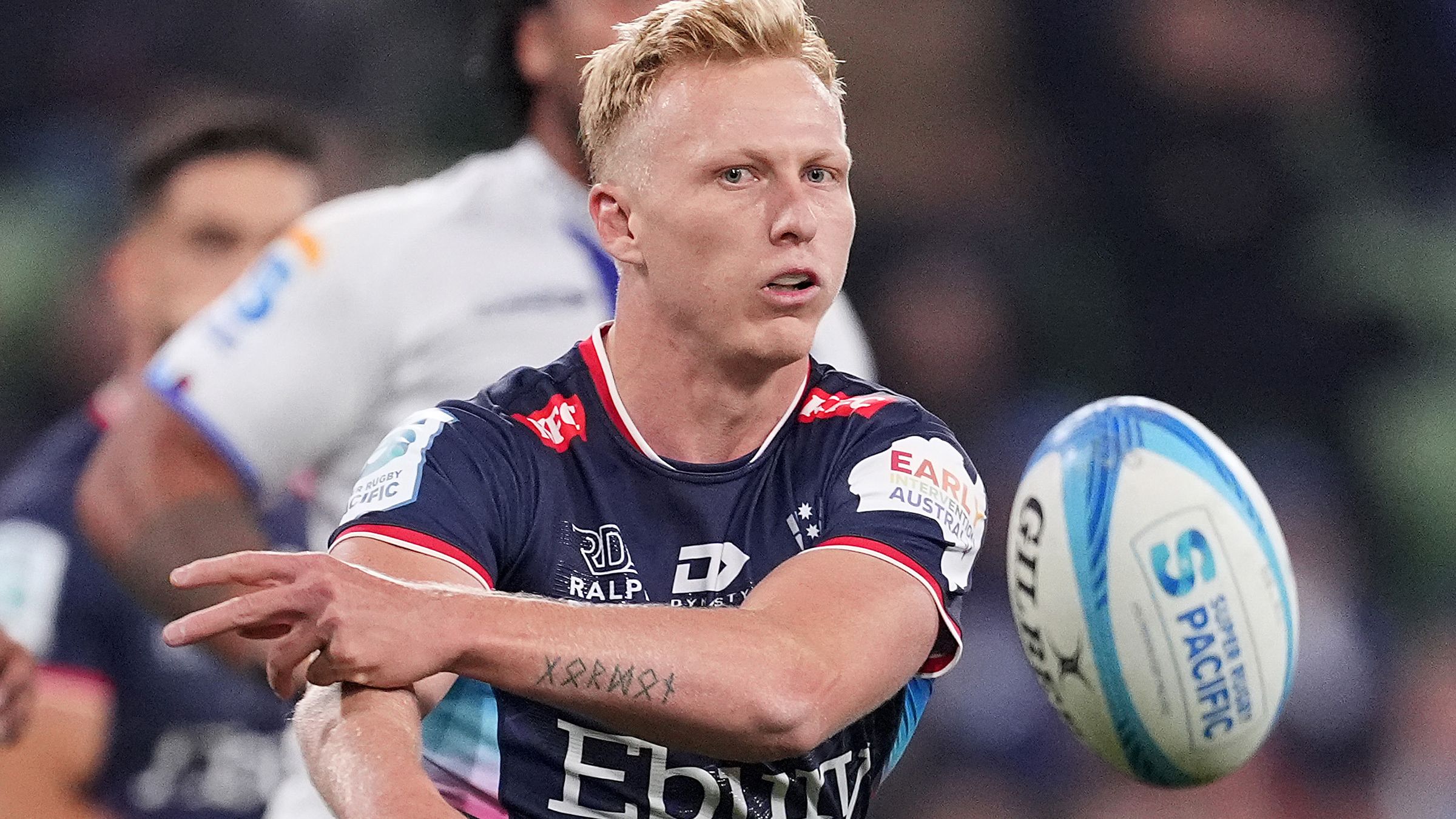 Carter Gordon of the Rebels passes the ball during the round 11 Super Rugby Pacific match between Melbourne Rebels and Blues.