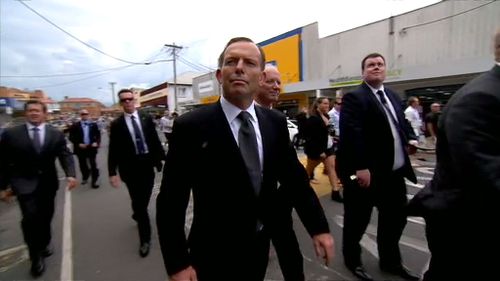 Tony Abbott joined the mourners in the funeral procession. (9NEWS)