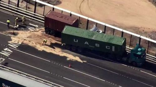 Traffic chaos was sparked in Melbourne after the second truck collided into a safety barrier on the bridge and caused more than 40 metres of damage.