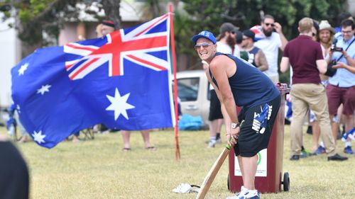 A man plays park cricket on Australia Day 2018 in Melbourne.