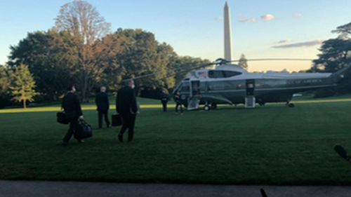 Donald Trump walking to Marine One as he heads to hospital.