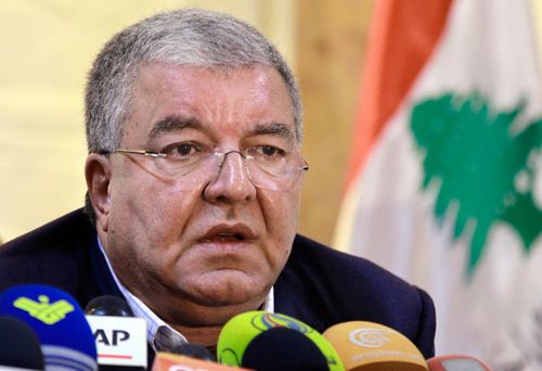Lebanese Interior Minister Nohad Machnouk told a press conference seven Syrians and two Lebanese were being held over the suicide attacks. (AAP)
