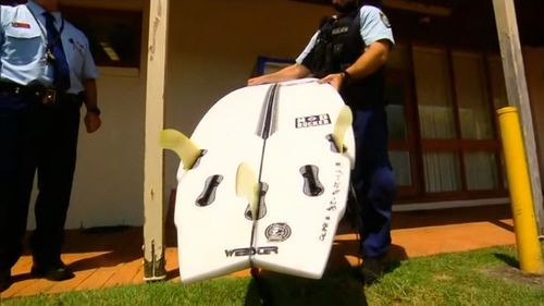 Lee Jonsson used his surfboard to try and frighten off the shark.