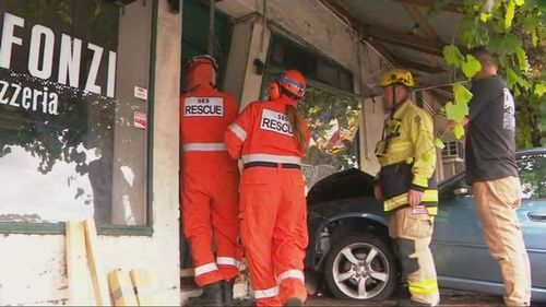 A car has ploughed into a pizza shop and sent takeaway boxes flying in Adelaide.