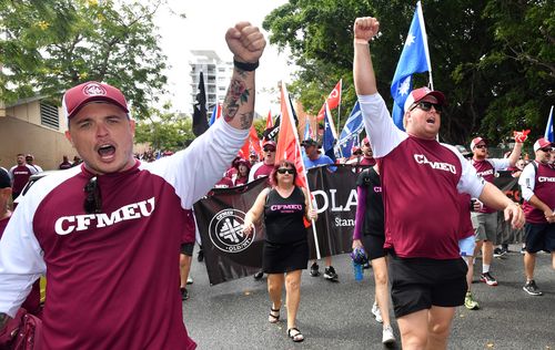 Members of the CFMEU are seen during the annual Labour Day march. (AAP)