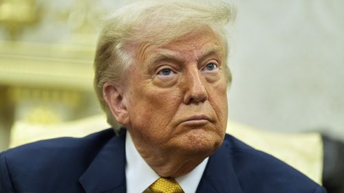 President Donald Trump listens during a meeting with Bahrain's Crown Prince Salman bin Hamad Al Khalifa in the Oval Office of the White House, Wednesday, July 16, 2025, in Washington.