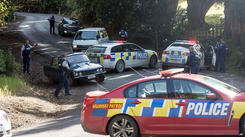 Two dead, house ablaze in NZ stand-off