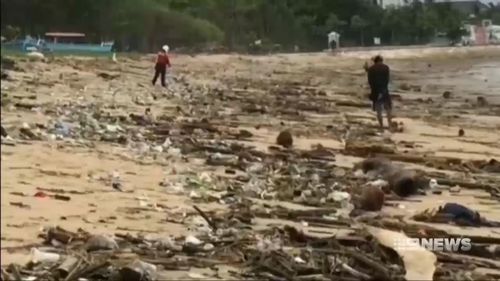 The debris has prompted the closure of beaches in Bali.