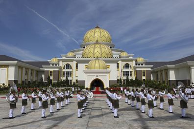 Military band perform during a welcoming ceremony of the 17th King of Malaysia, Sultan Ibrahim Iskandar at National Palace in Kuala Lumpur, Malaysia Wednesday, Jan. 31, 2024. 