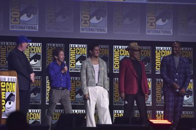 Kevin Feige, from left, Tim Blake Nelson, Danny Ramirez, Giancarlo Esposito, and Anthony Mackie attend a panel for Marvel Studios during Comic-Con International