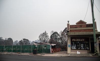 The remains of burnt-out businesses, in close proximity to unaffected buildings in Cobargo, Thursday, January 16, 2020. Bushfires swept through Cobargo on New Years Eve 2019 killing two, and destroying several homes and businesses. (AAP Image/James Gourley) 
