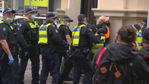 Police arrested a small number of protesters this morning on Elizabeth Street in Melbourne. 