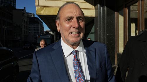 Brian Houston enters Downing Centre courts Photo Nick Moir 15 June 2023