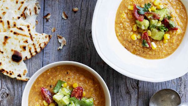 Mexican corn soup with crushed avocado