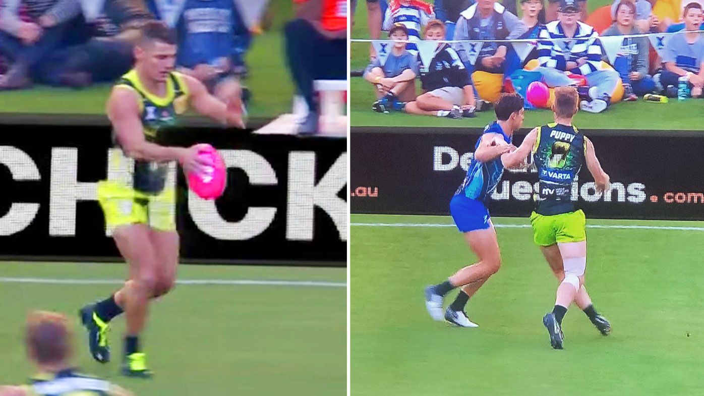 AFLX players clash with the green screen