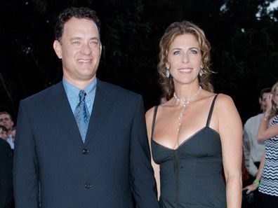 393793 03: Actor/producer Tom Hanks (L) and his wife Rita Wilson attend the film premiere of "Band Of Brothers" August 29, 2001 Los Angeles, CA. (Photo by Frederick M. Brown/Getty Images)