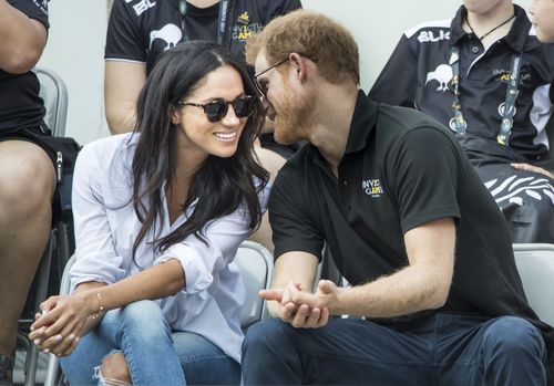 Prince Harry and Meghan Markle watching Wheelchair Tennis at the 2017 Invictus Games in Toronto. (AAP)