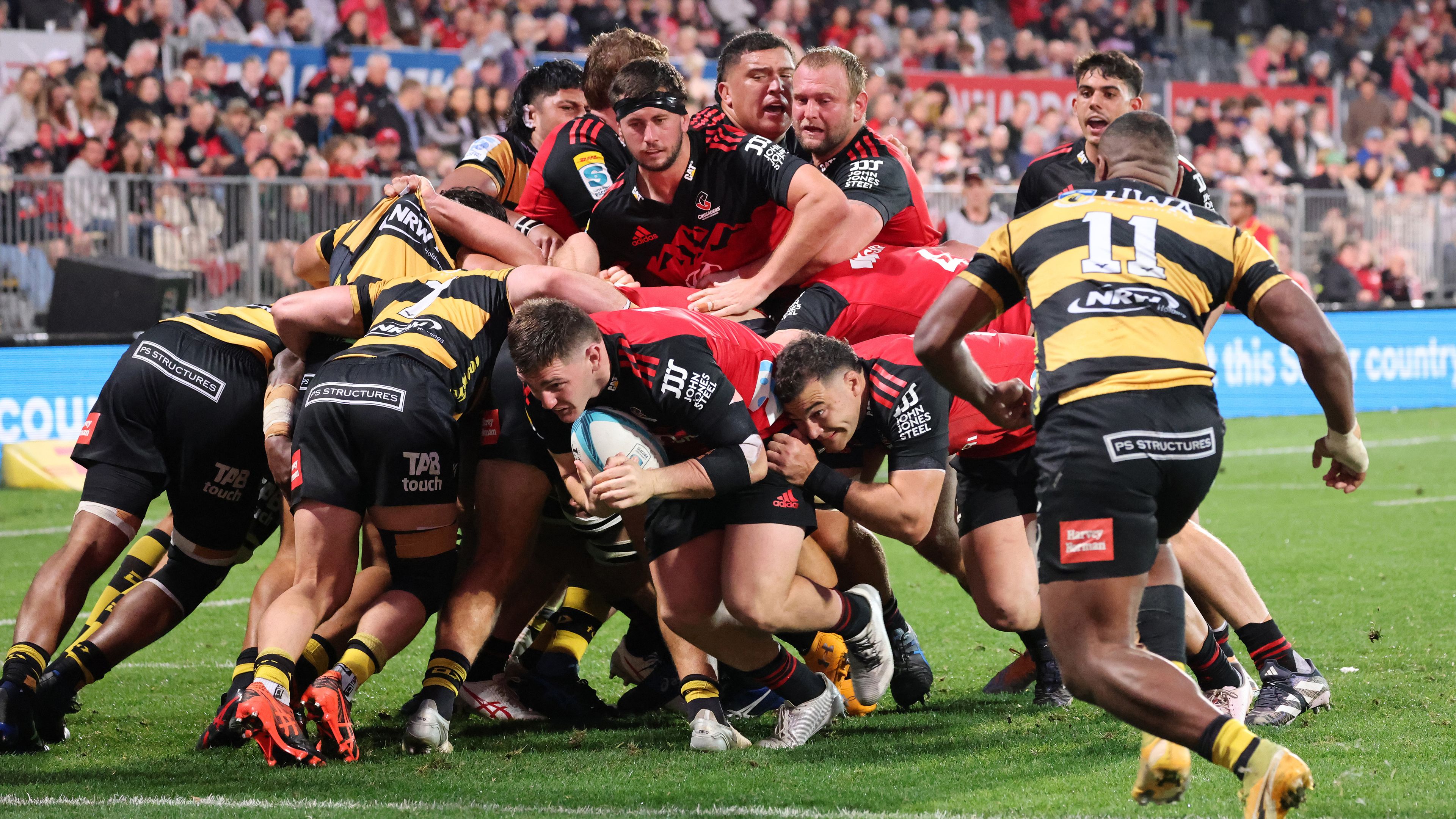 Brodie McAlister dives to score his third try off a maul during the round 11 Super Rugby Pacific match between Crusaders and Western Force.