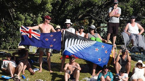 The proposed alternative New Zealand Flag (right) is seen alongside the current flag during a cricket Test match between Australia and New Zealand in Wellington, 2016.