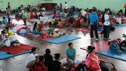 Residents stay at a temporary shelter as they evacuate following increasing seismic activity of Mount Agung in Karangasem, Bali. (AAP)