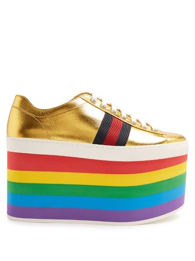 Gucci platform trainers $1035 at <a href="http://www.matchesfashion.com/au/products/Gucci-Peggy-low-top-rainbow-platform-trainers--1074583" target="_blank">Matches</a><br>