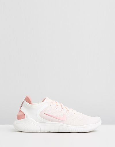 <a href="https://www.theiconic.com.au/free-run-2018-women-s-584068.html" target="_blank" title="Nike Free Run 2018 in Guava Ice, Rust Pink and Pink Tint, $170" draggable="false">Nike Free Run 2018 in Guava Ice, Rust Pink and Pink Tint, $170</a>