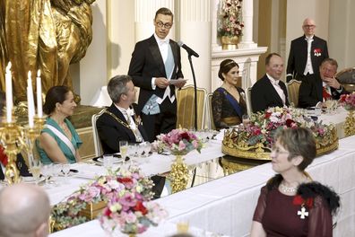 President of the Republic of Finland Alexander Stubb gives a speech at gala dinner for King Frederik X, center left, and Queen Mary, center right, of Denmark the Presidential Palace in Helsinki, Tuesday, March 4, 2025. (Roni Rekomaa/Lehtikuva via AP)