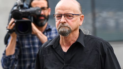 Peter Koenig departs the Brisbane Supreme Court in Brisbane.