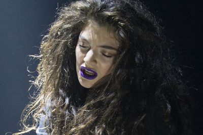 A more demure stinky face is still a stinky face...sorry Lorde!